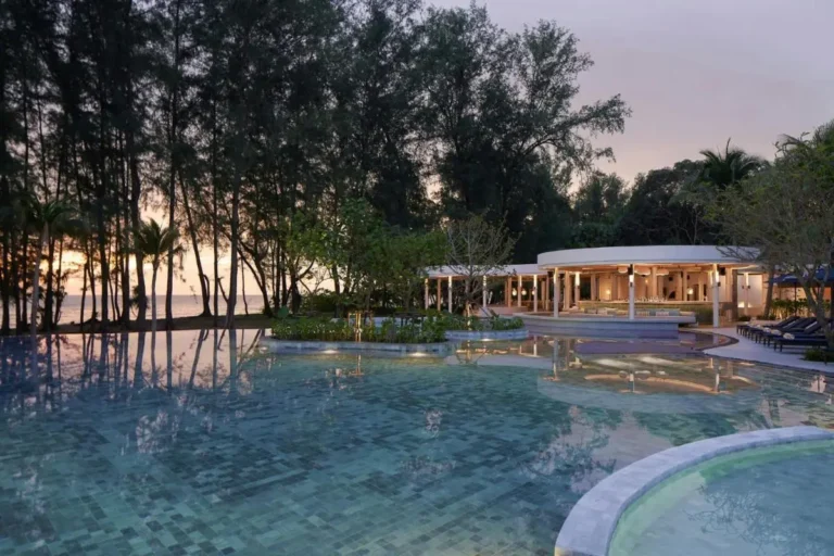 Tranquil Outdoor Pool and Spa Area with Ocean View at Mai Khao Beach
