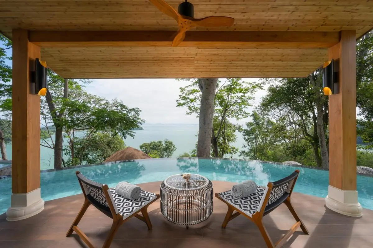 Tranquil Outdoor Seating and Infinity Pool with Scenic View in Phuket Town