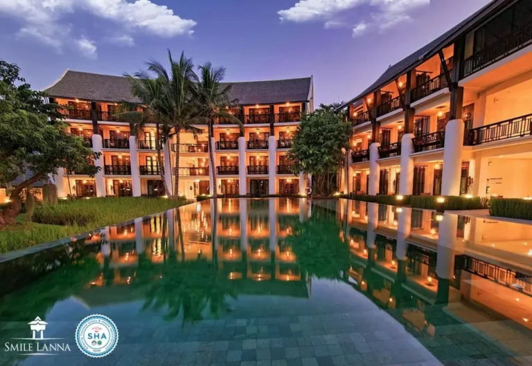 Tranquil Outdoor Swimming Pool and Courtyard with Palm Trees in Hai Ya Chiang Mai