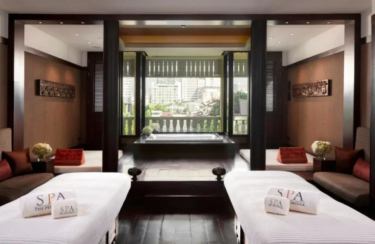 Tranquil Spa Room with Massage Tables and Soaking Tub in Khlong San Bangkok