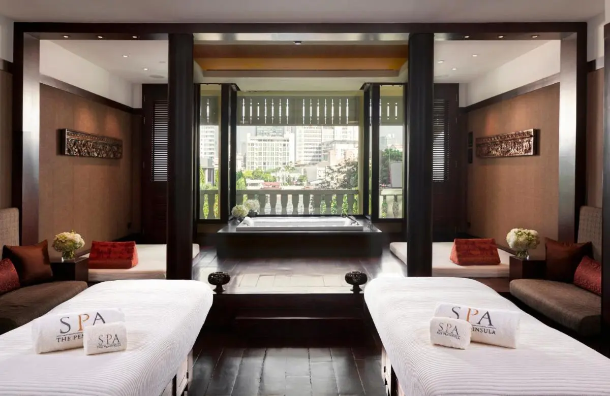 Tranquil Spa Room with Massage Tables and Soaking Tub in Khlong San Bangkok