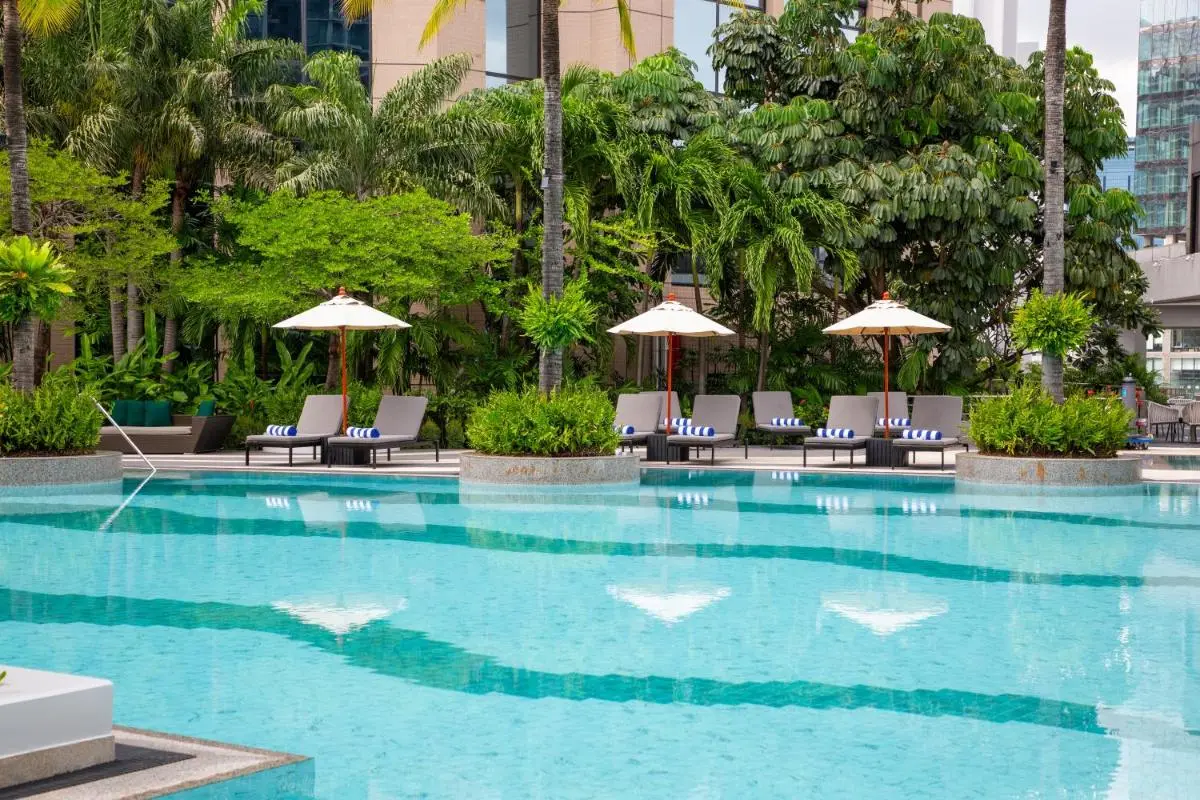 Bangkok Province Urban Outdoor Swimming Pool with Lounge Area and Tropical Greenery in Khlong Toei Bangkok
