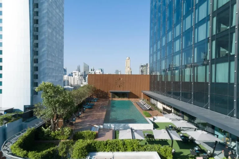 Urban Rooftop Swimming Pool and Lounge Area with Jacuzzi in Wattana Bangkok