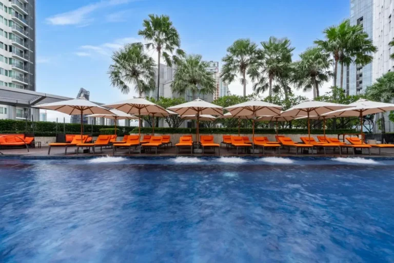 Urban Rooftop Swimming Pool with Jacuzzi and Lounge Area in Wattana Bangkok